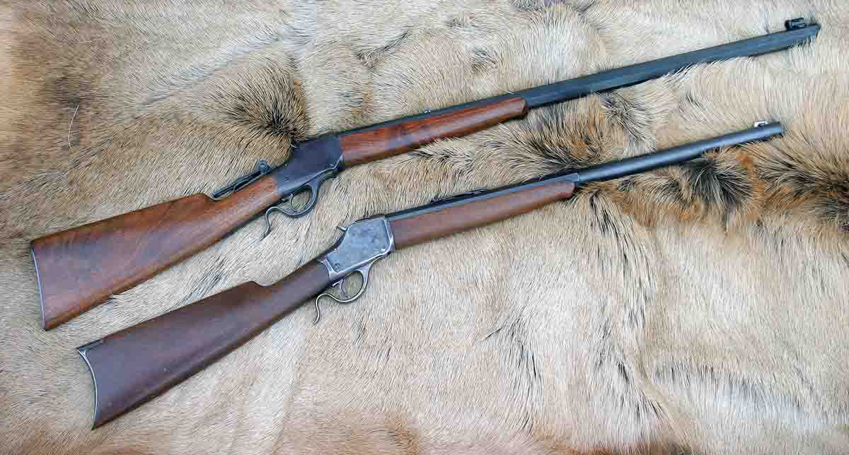 The original Winchester 1885 High Wall (bottom) was a .40-82 WCF with a very worn barrel. After being rebored to .45-70, it was just as accurate as the custom-barreled Ballard .45-70 (top).